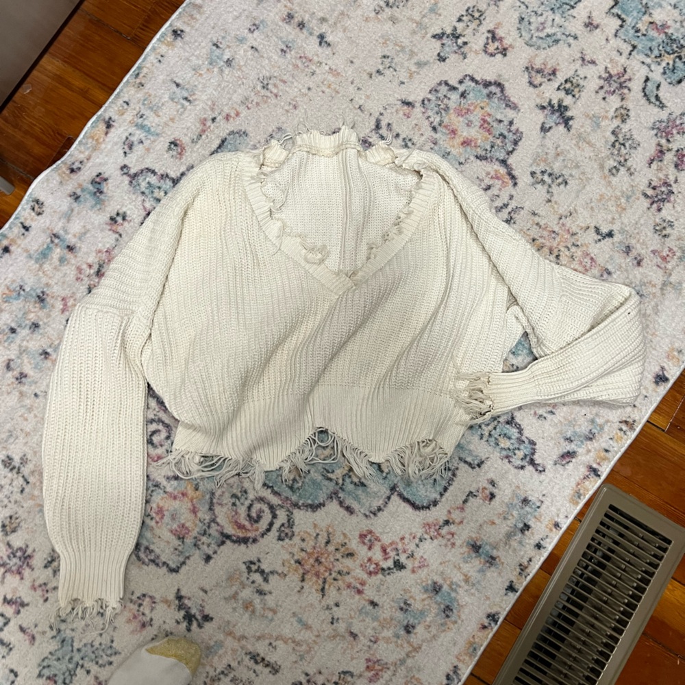 Cream Knit Sweater with Fringe Details